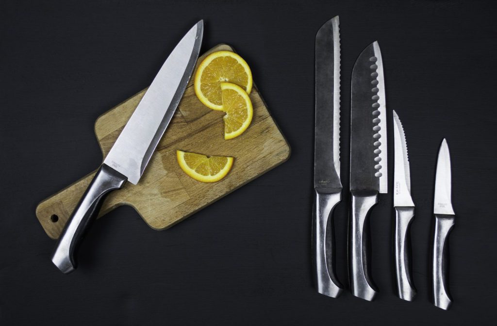 A Shiny New Set Of Knives Chopping Board